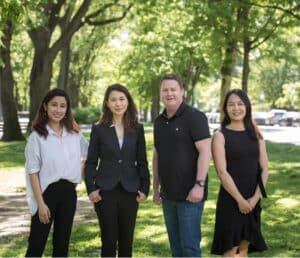 Three women and a man in the park