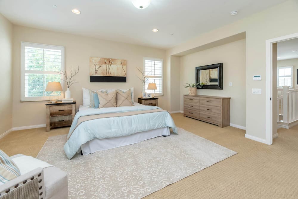 Bright modern bedroom in a Wellesley home, representing rising housing inventory for the Spring market.
