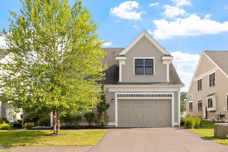Front exterior of 14 Millstone Drive Unit 14, a luxury townhome listing in Sherborn, MA by Team Coyle.
